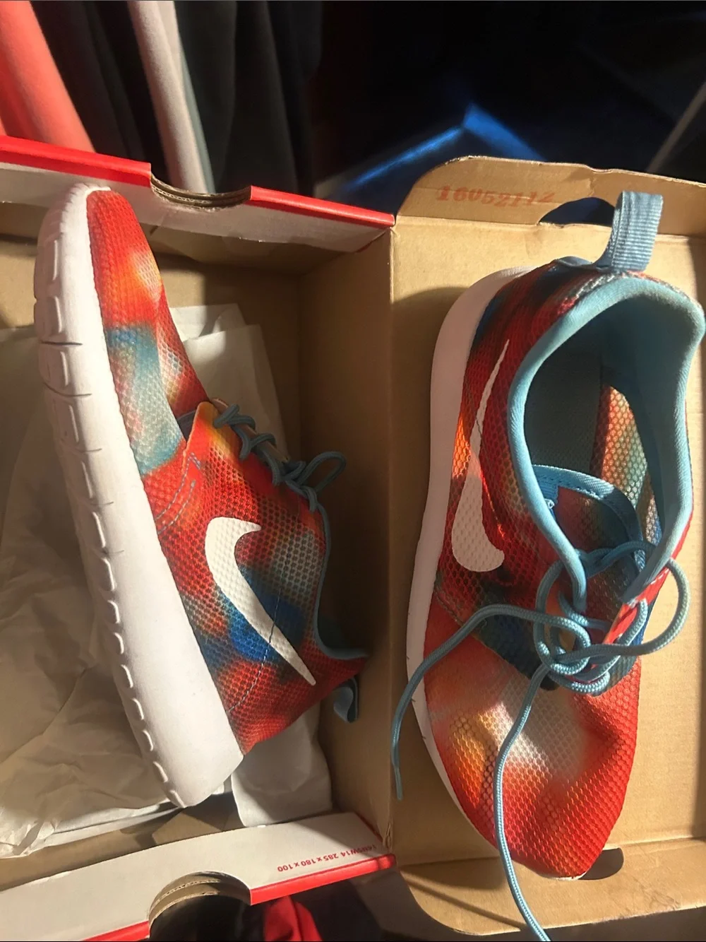 Nike womans Redish Orange & Blue Roshe